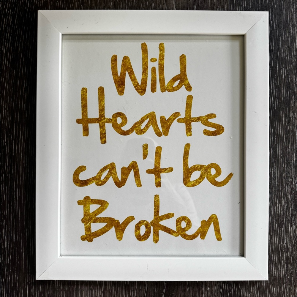 Wild Hearts can’t be Broken Gold Text Wall Art in White Frame